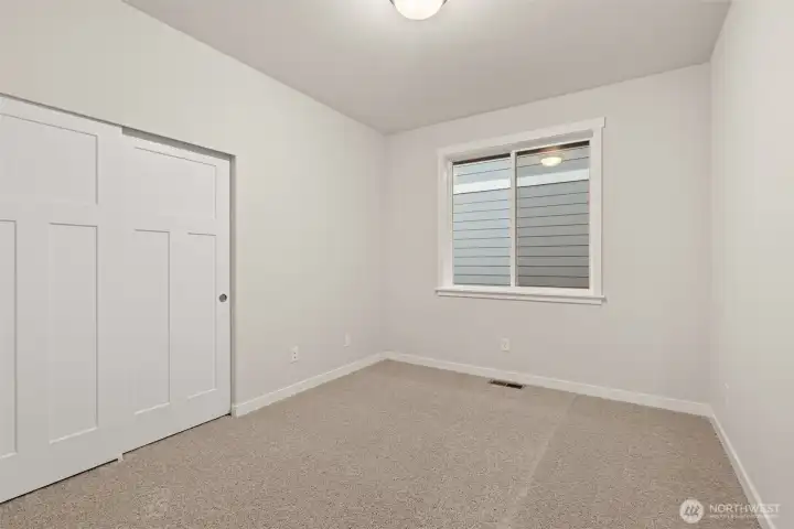 Second bedroom with a reach-in closet.