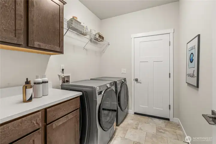 Virtually staged laundry room.