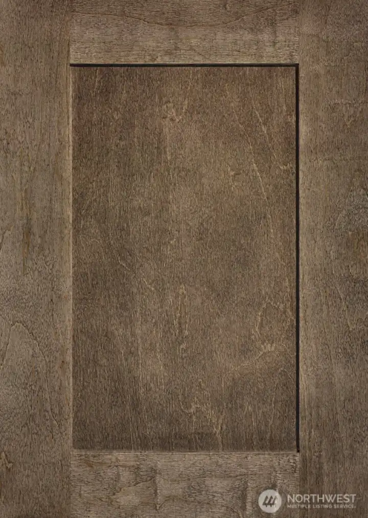 Shaker-style Cocoa-stained maple cabinets throughout.