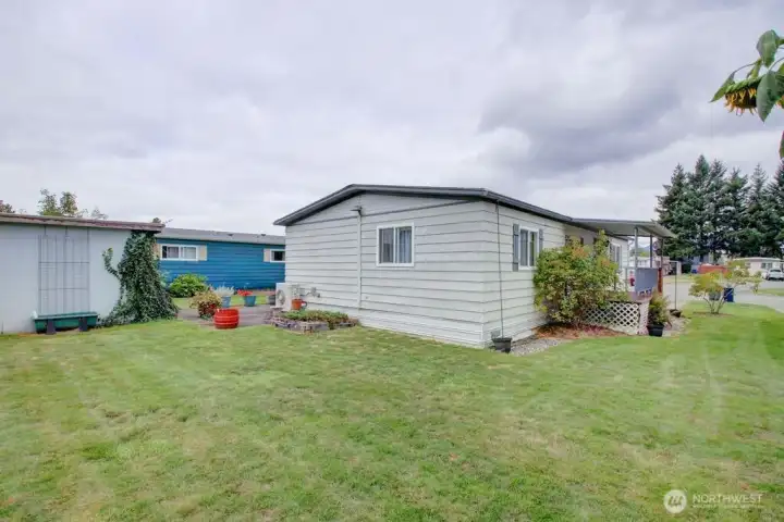 View of yard and home from back corner of property.