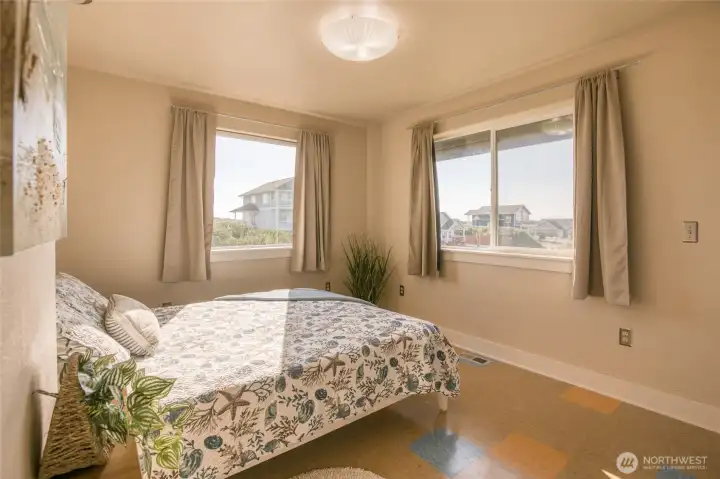 2nd bedroom with East facing windows for the perfect sunrise.
