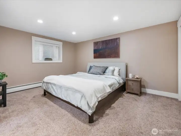 Spacious primary suite includes a private bath