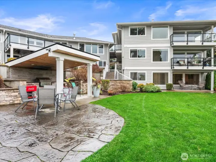 Gather with friends in the community outdoor kitchen