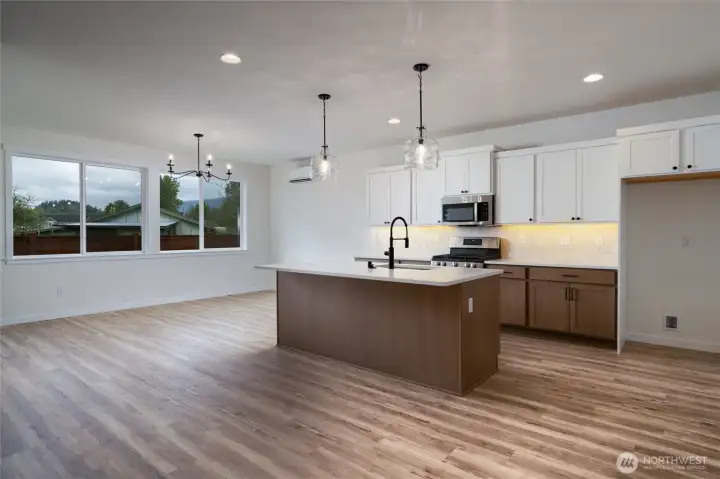 Kitchen - Pics are of a different 3049 plan. Features and colors may differ.