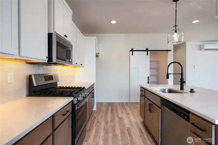 Kitchen - Pics are of a different 3049 plan. Features and colors may differ.