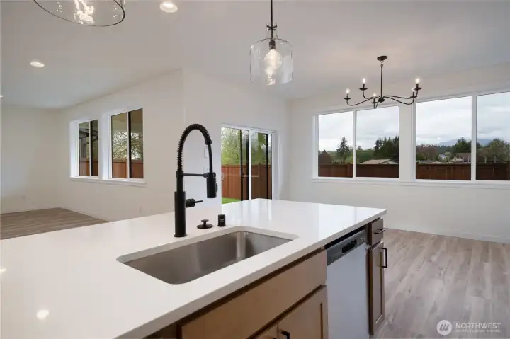 Kitchen - Pics are of a different 3049 plan. Features and colors may differ.