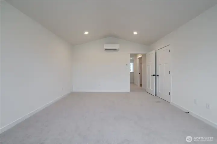 Upstairs primary bedroom - Pics are of a different 3049 plan. Features and colors may differ