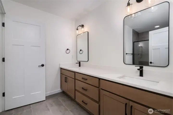 Upstairs primary bathroom - Pics are of a different 3049 plan. Features and colors may differ