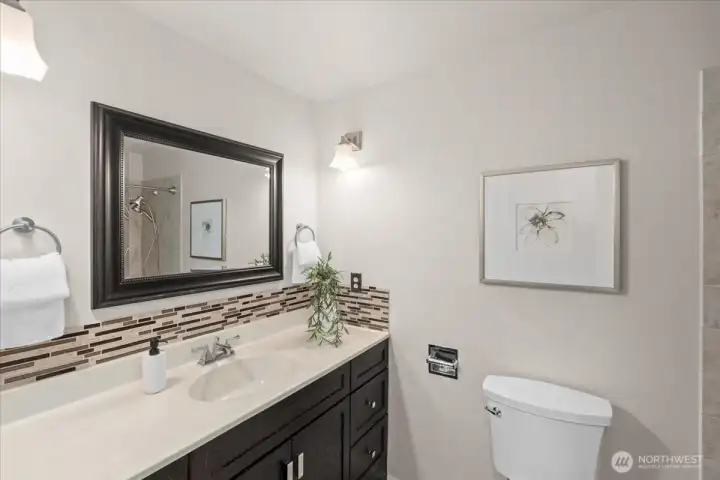 Full Bath located off hallway upstairs