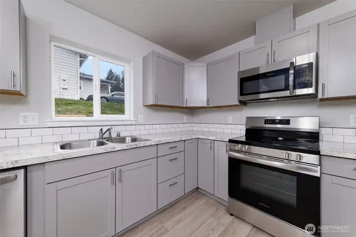 stainless steel appliances - light and bright kitchen
