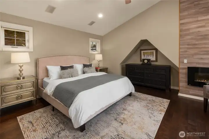 Primary suite with fireplace and private view deck