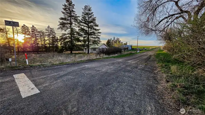 Welcome to 101 US Hwy 2 in Waterville! Captured here looking northwest from the highway, this fantastic property offers entirely usable land ready for your vision.