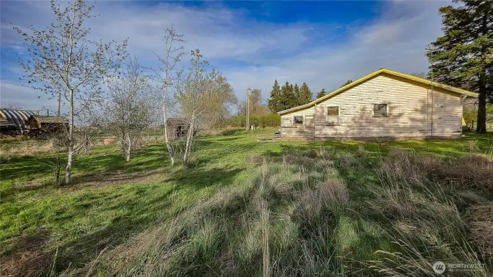 Looking East from the West side of the home: A true diamond in the rough. Enjoy peaceful seclusion and privacy while remaining just minutes from the conveniences of Waterville.