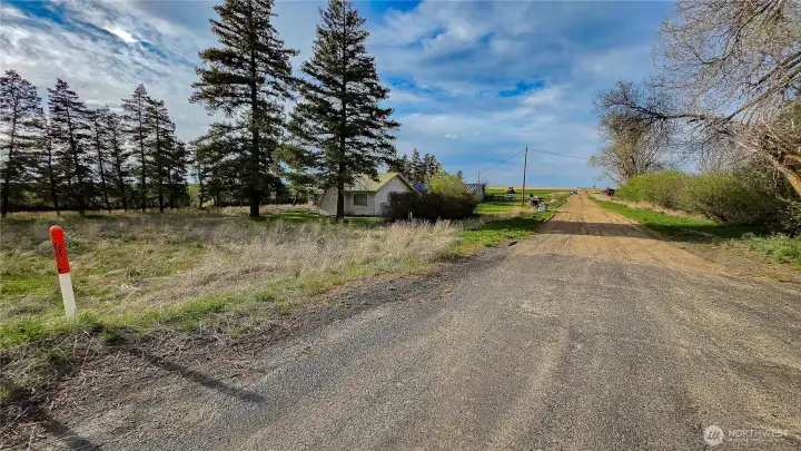 Rd A NW runs directly along the east boundary of the property, providing incredibly convenient, secondary access to the entire lot—perfect for bringing in equipment or planning future development.