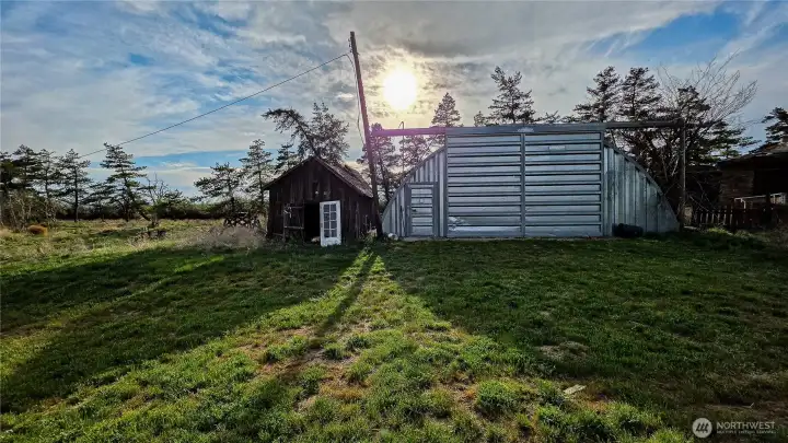 Now let's take a look at the massive 40 x 60 Quonset hut! This incredible shop space is an absolute dream, offering endless room for projects, equipment storage, RV parking, or a home workspace. Located at the North area of the property.