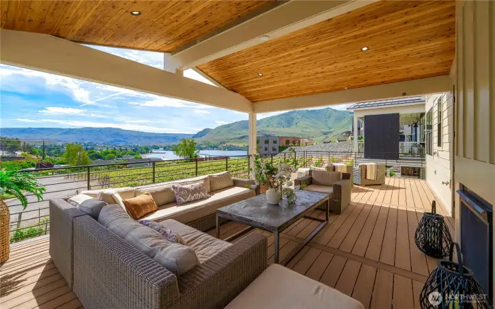 Covered Outdoor Living with a See Through Fireplace Covered Outdoor Living with a See Through Fireplace