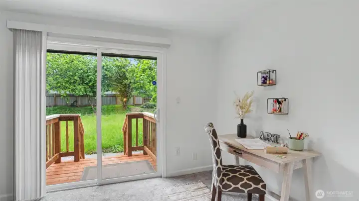This main-level bonus space could be used as an office, den, or extra dining space.
