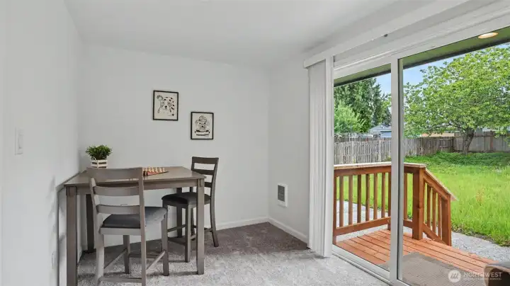 The office/den opens to the new backyard deck and grounds.