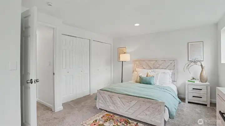 Dual closets in the primary bedroom offer additional storage.
