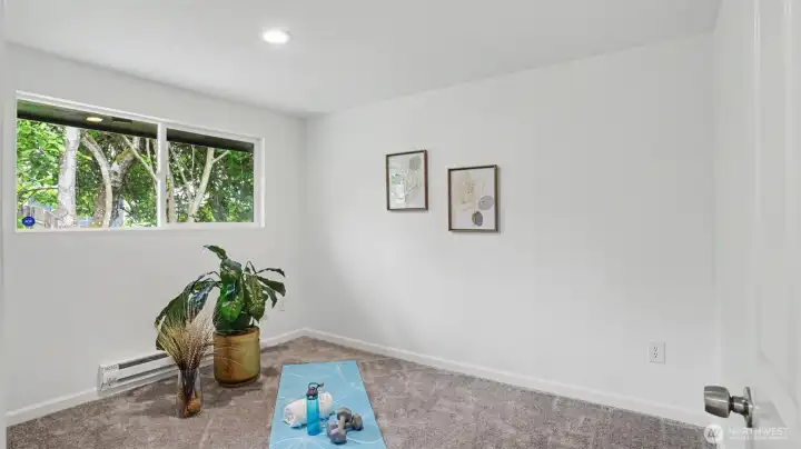 Standard size main-level guest bedroom.