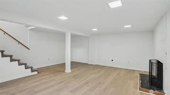 This large bonus room with hardwood floors is perfect for entertaining.