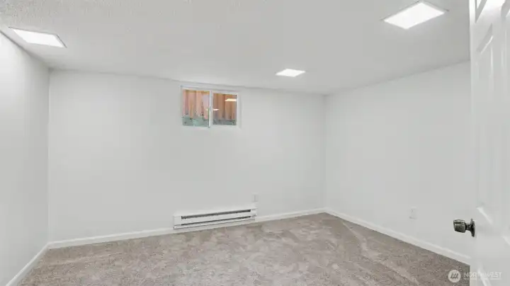 The third bedroom is located in the finished basement, comes complete with new carpet.