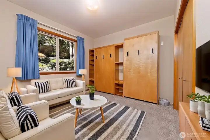 Virtually staged bedroom on the main floor with TWO built-in Murphy beds! Virtually staged bedroom on the main floor with TWO built-in Murphy beds!