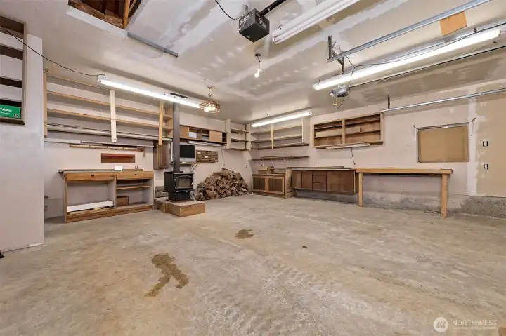 Inside the wonderful garage, with another wood stove Inside the wonderful garage, with another wood stove
