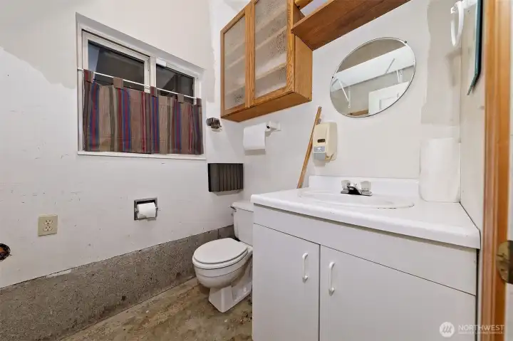 Half bathroom inside the garage Half bathroom inside the garage