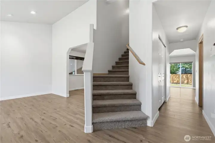 As you walk in the home you are greated with high ceilings, bright windows, and a space that flows and functions!