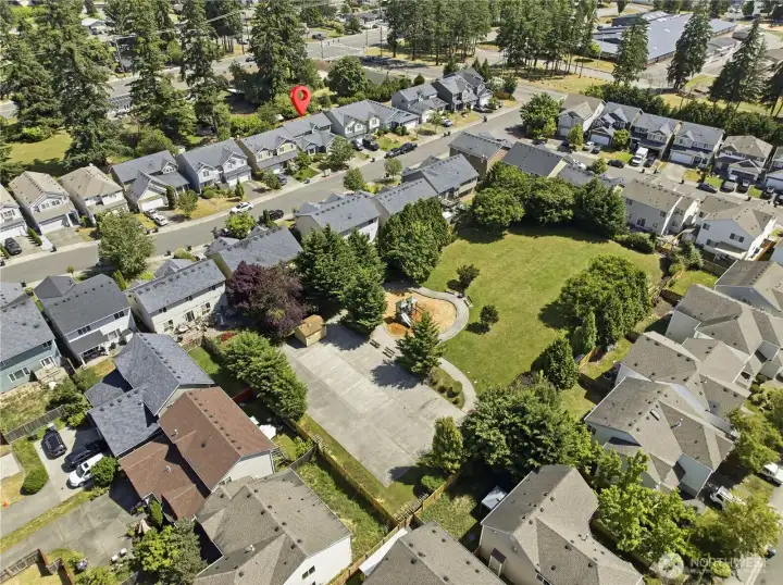 Across the street you'll find the neighborhood park, playground, and sport court!