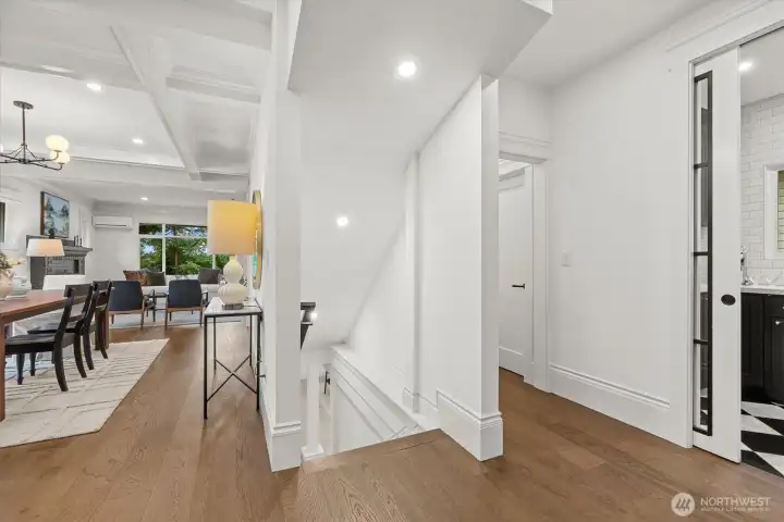 Come on downstairs with me.  Lower level includes large family room, kitchenette, guest bedroom, guest bathroom, laundry, and exterior access to backyard.