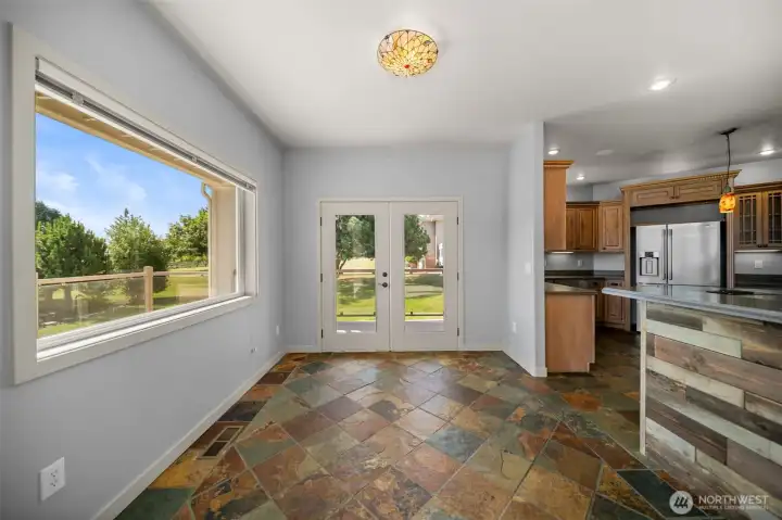Breakfast Nook Opens to Covered Wrap Around Porch