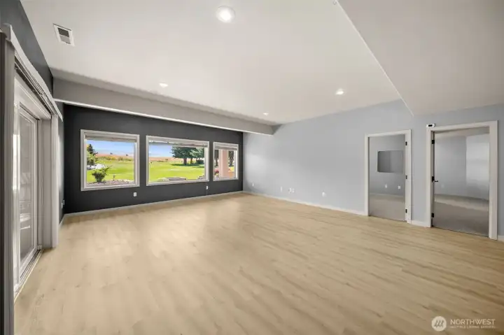Huge Family Room with Access to Yard and Gardens Through Slider