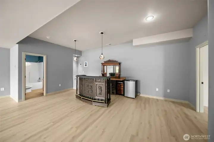 Lower Level Bar Area with Two Wine Fridges and Beverage Fridge