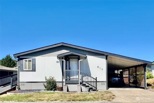 Lovely spacious double wide with carport