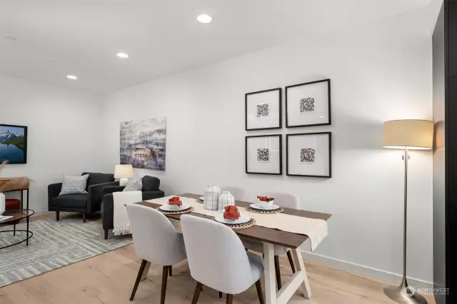 This dining area invites you to gather around; this space effortlessly bridges the living and kitchen areas.