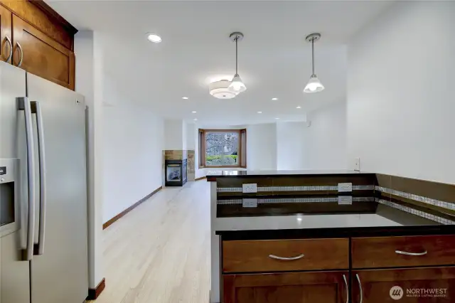 Kitchen open to living room and dining area