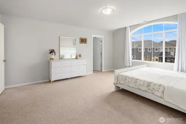 This primary bedroom has his & hers walk-in closets. Plenty of room for a King Size Bed.
