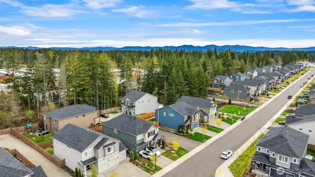 This homes has a nice quiet location within the Preston Woods Subdivision.  In this photo the home is the 2nd home in on the left with the white cars in the driveway. Off Street Parking for company.