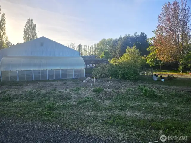 Greenhouse attached to shop