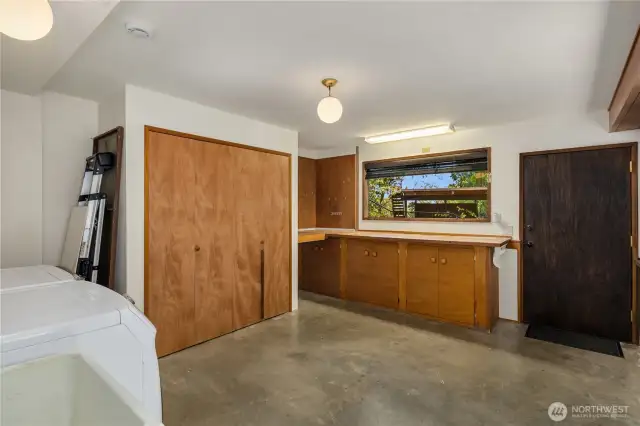 Lower level workshop and laundry center