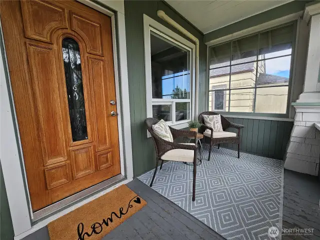 Enjoy sitting on this fully covered porch and soak in some daylight