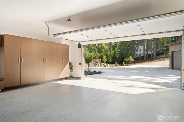 Pull right into the driveway in the 2-car attached with so many cabinets & a work bench