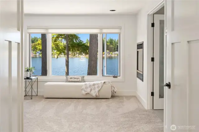 Double door entry x2 into the Primary Suite featuring views, views and a see-through fireplace to make it cozy.