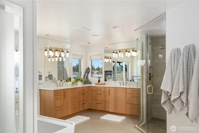 Completely remodeled Primary bath with beautiful pendants and views to enjoy while getting ready for your day.