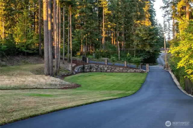 This view is reverse from the road as if you are leaving The Pointe at Lake Sawyer, going through your gate on newly recast asphalt. It’s pretty!