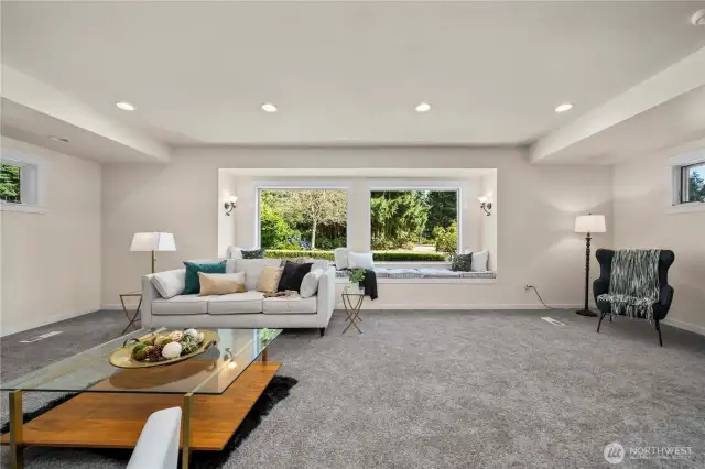 Large window with seating is perfect for enjoying a book!
