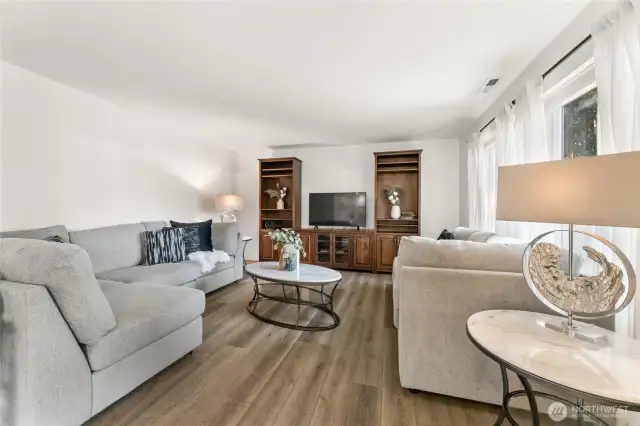 Spacious living room with new luxury vinyl flooring