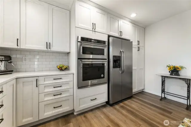 These off-white cabinets are high-end with so much storage space!